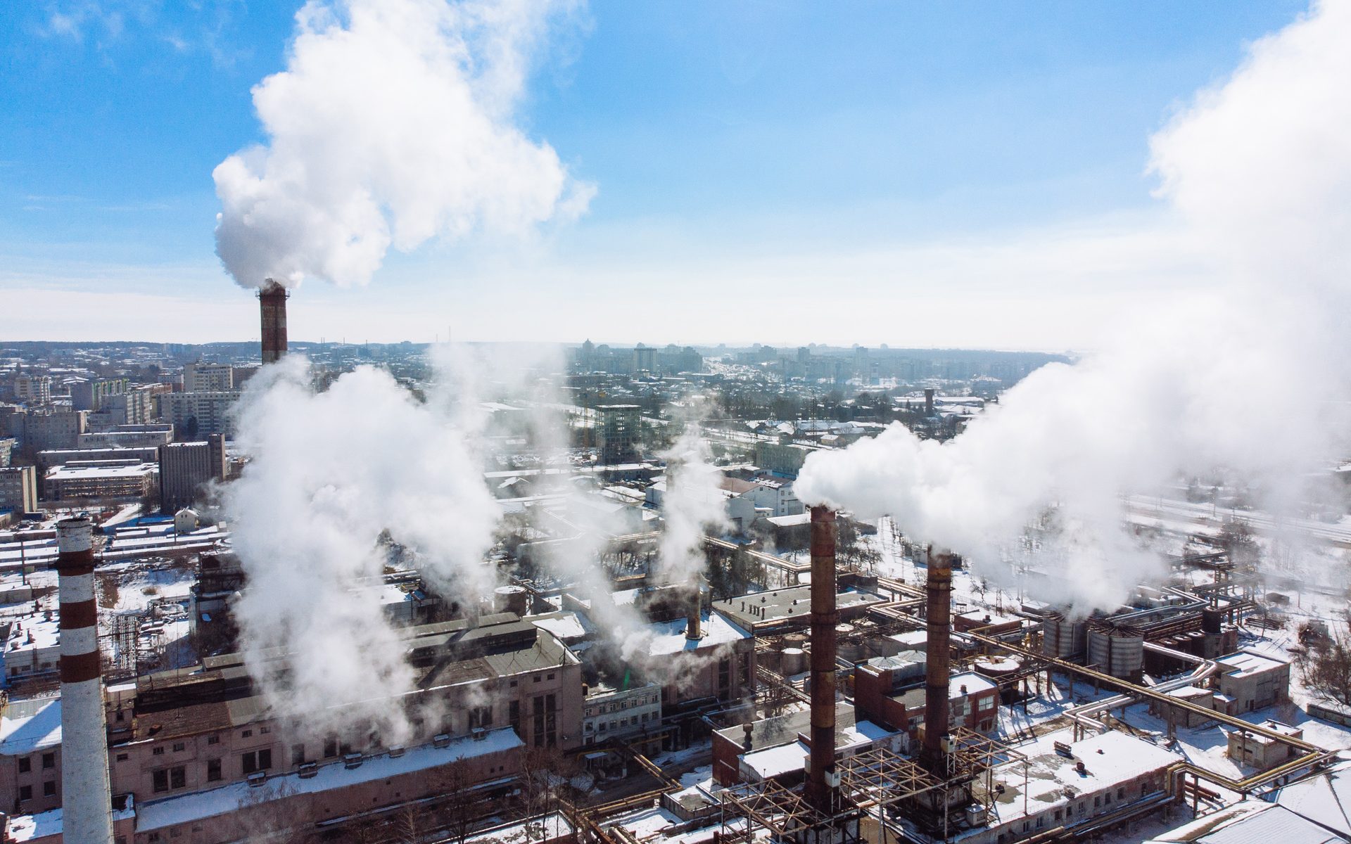 aerial view of smog pollution from city factory. winter time